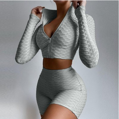 Conjunto de chaqueta y leggings deportivos